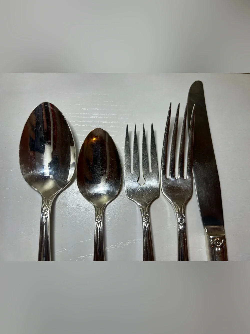 Stainless Set of Silverware (2 sets of spoons, 2 sets of forks, 1 set of knifes)